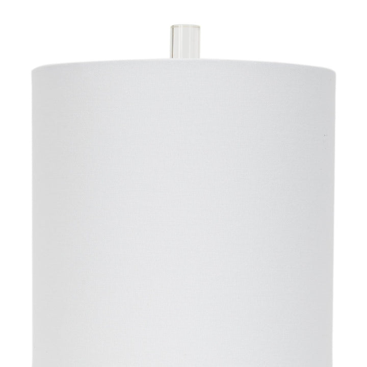 Table lamp with white fabric drum shade and clear crystal base, brass finish