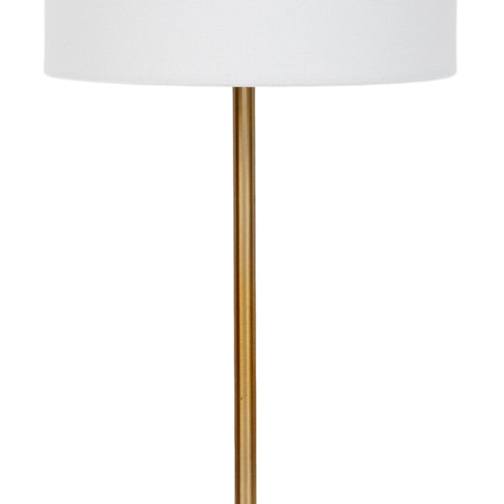 Table lamp stand with tall brass stem and white fabric drum shade