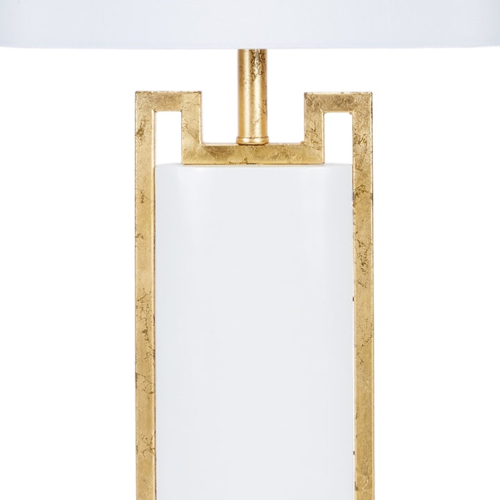 White lamp shade with gold geometric frame and vertical support pole