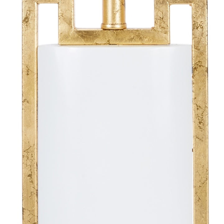 White lamp shade with gold top frame and central pole detail