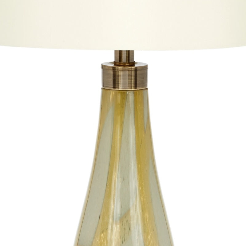 Hand-blown amber glass lamp with brass collar and fabric shade