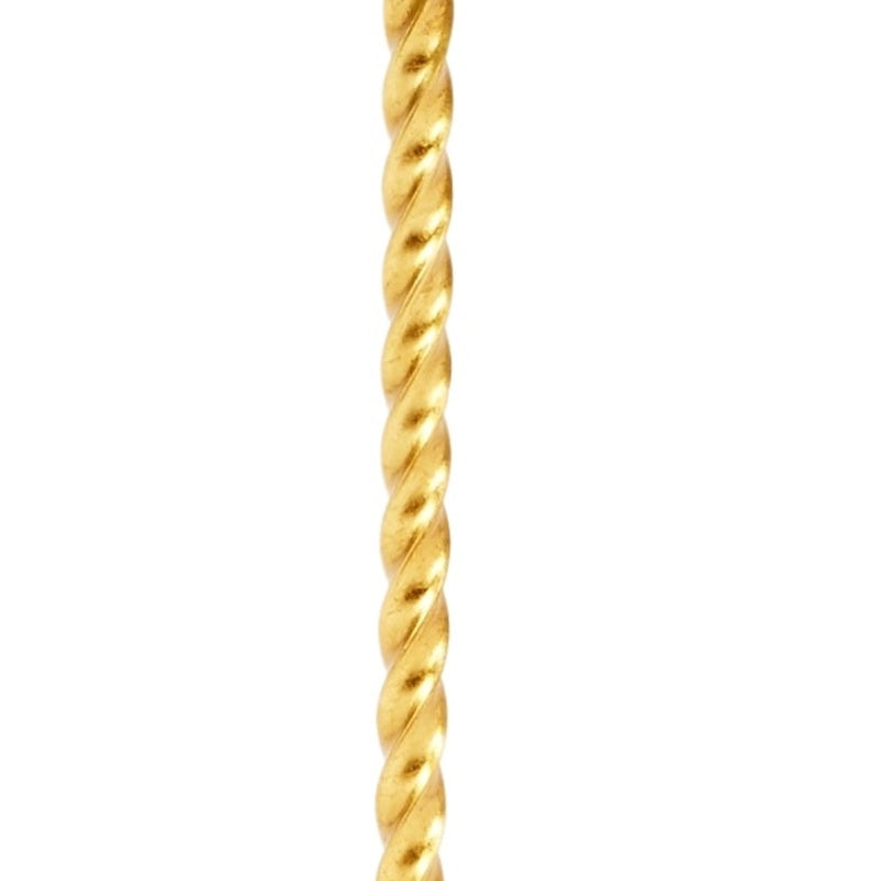 Gold twisted rope lamp stem in close-up, braided spiral texture.