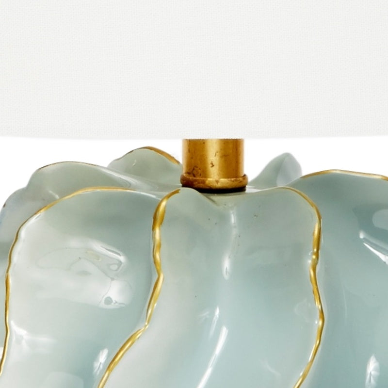 Blue ceramic lamp top with gold neck and wavy gold-trim details