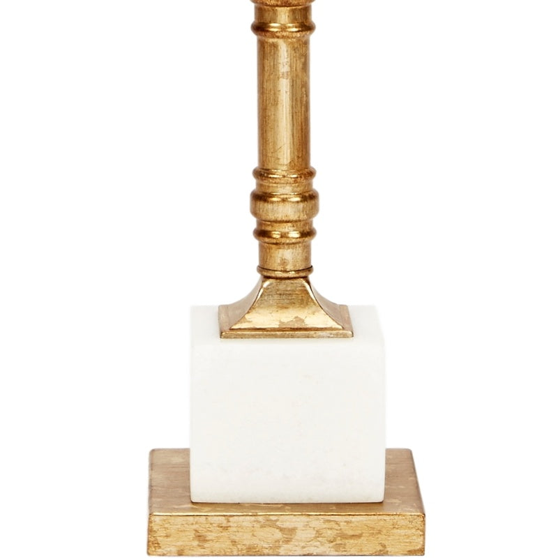 Aged gold column with white marble lamp base