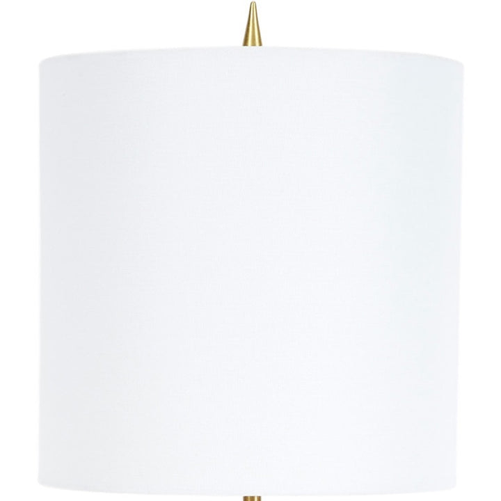 Table lamp with white fabric drum shade and brass stem