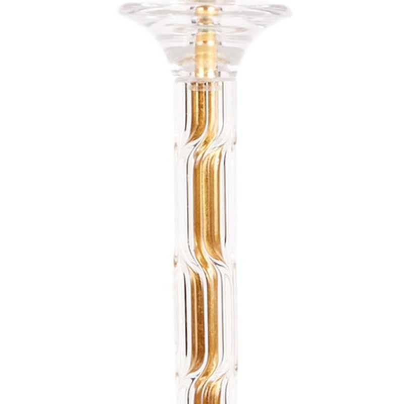 Clear acrylic table lamp stem with gold center band under white shade