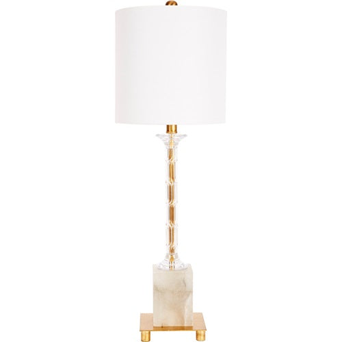 Decorative lamp with white shade and gold accents on a white background.