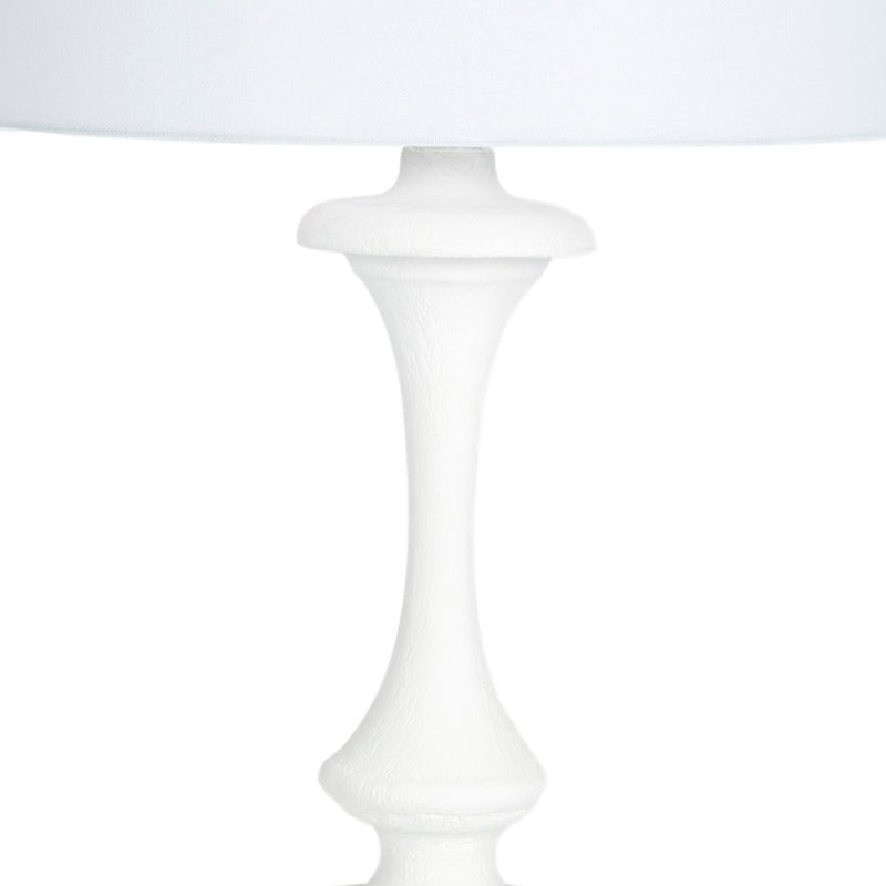 White gesso table lamp with fabric shade and turned base