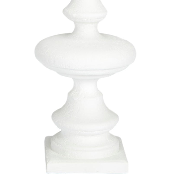 White gesso table lamp base and pedestal, fabric shade partially shown