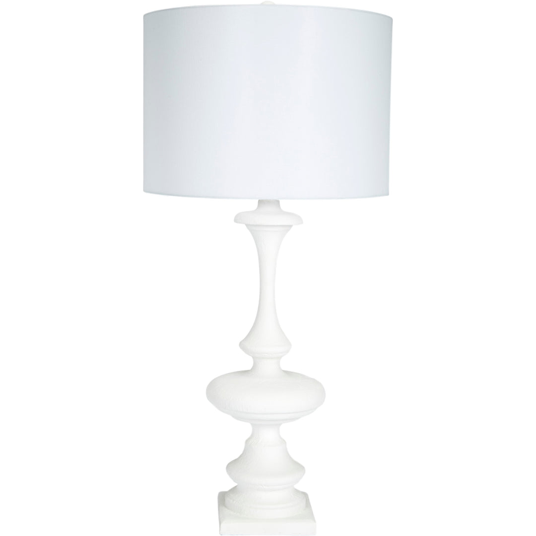 Barnes white gesso table lamp with a natural linen shade, perfect for brightening up living rooms, bedrooms, or offices.