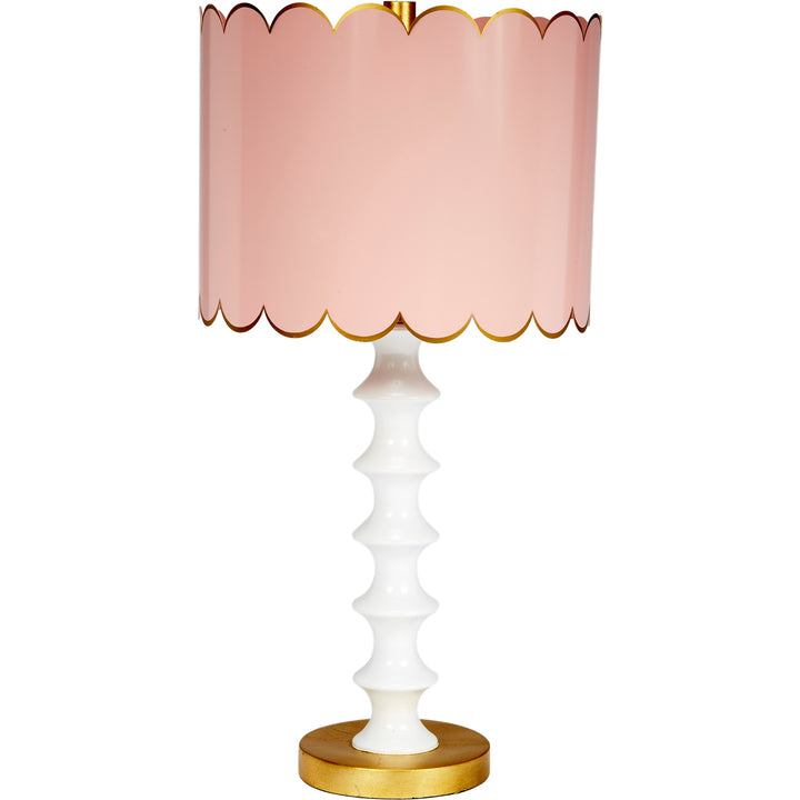 Charming Eloise table lamp featuring a blush base and a white scalloped shade, perfect for adding a soft, feminine touch to your living room or bedroom.