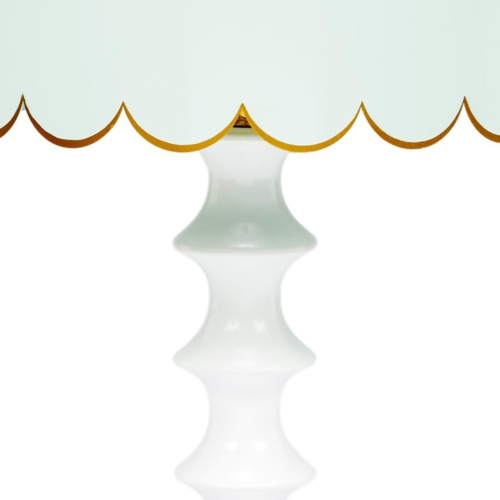 Mint blue and white table lamp body with gold top ring and fluted ceramic design.