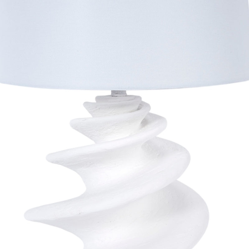 Linen drum lamp shade over white gesso shell-style spiral base