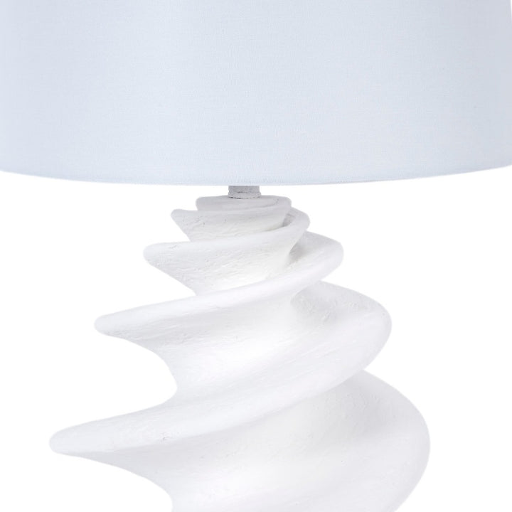 Linen drum lamp shade over white gesso shell-style spiral base