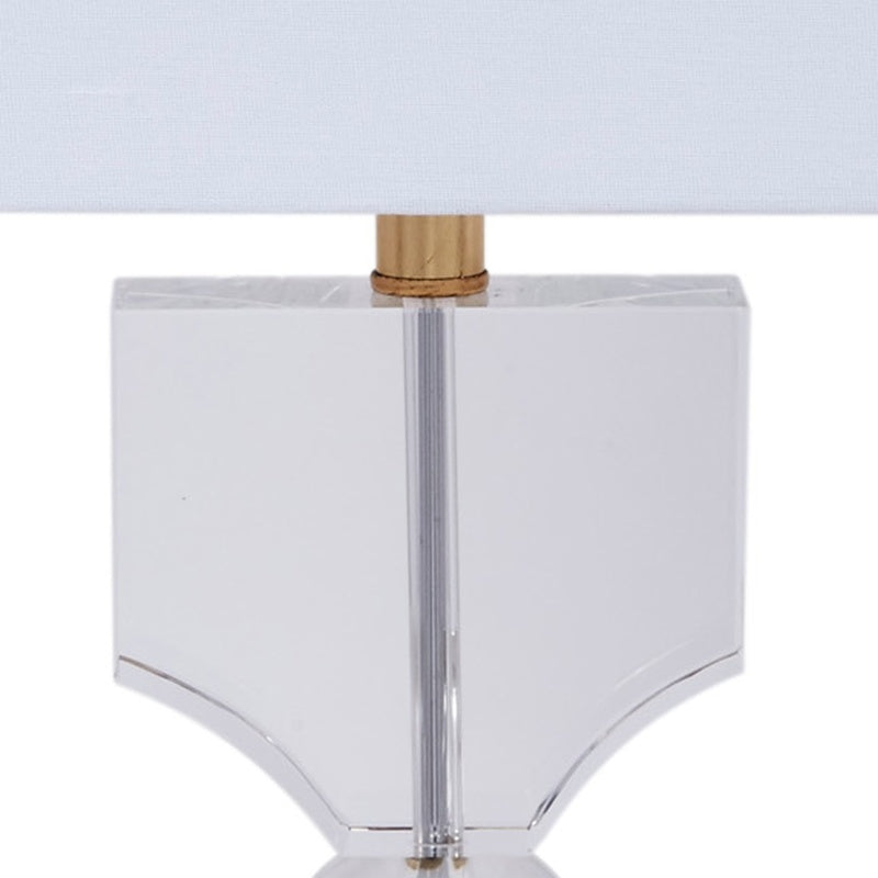 Silver table lamp top: white shade with chrome column and gold stem