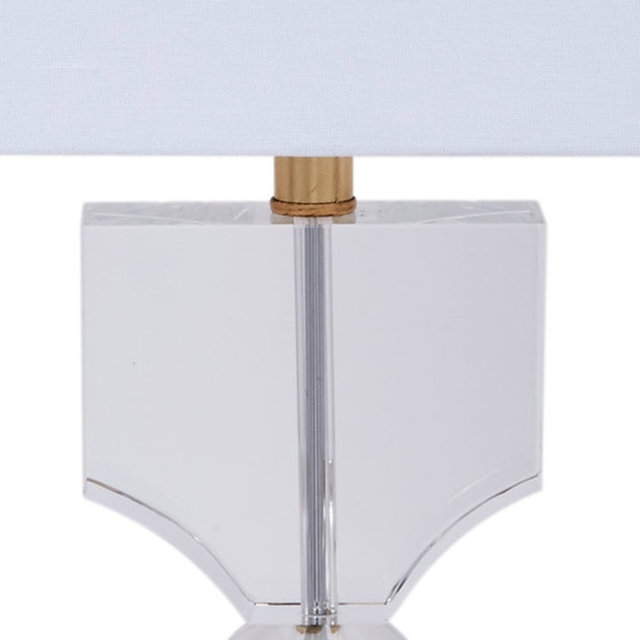 Silver table lamp top: white shade with chrome column and gold stem