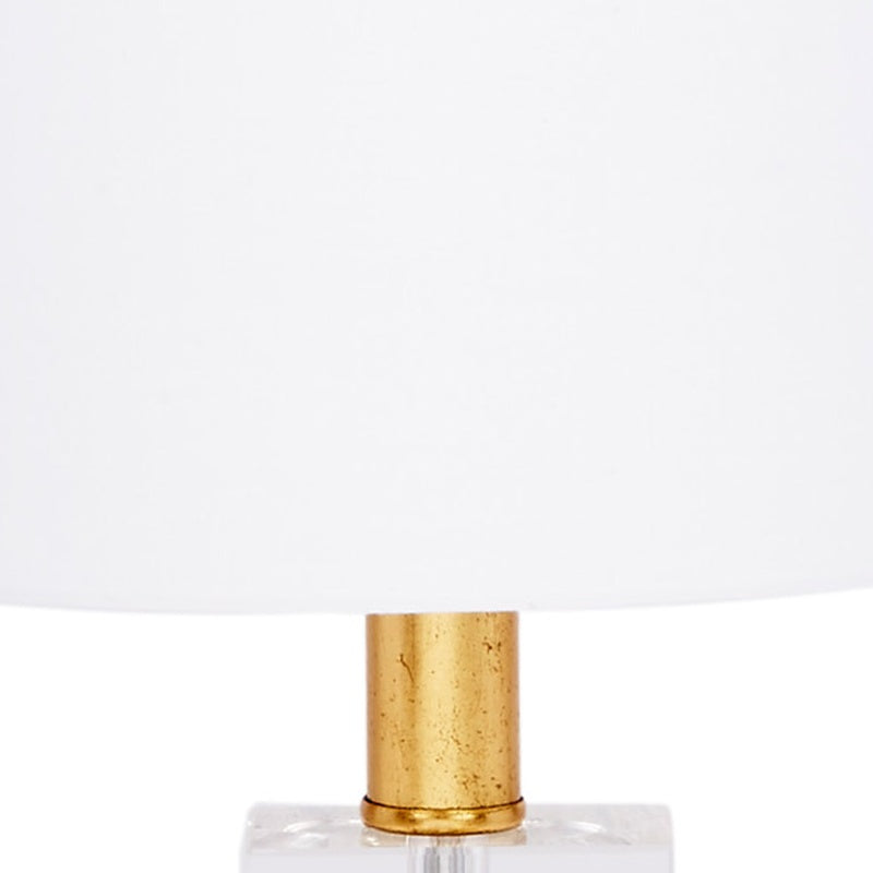 Mini lamp with white linen drum shade and brass column