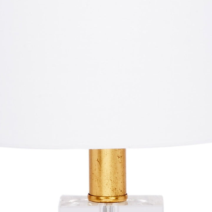 Mini lamp with white linen drum shade and brass column