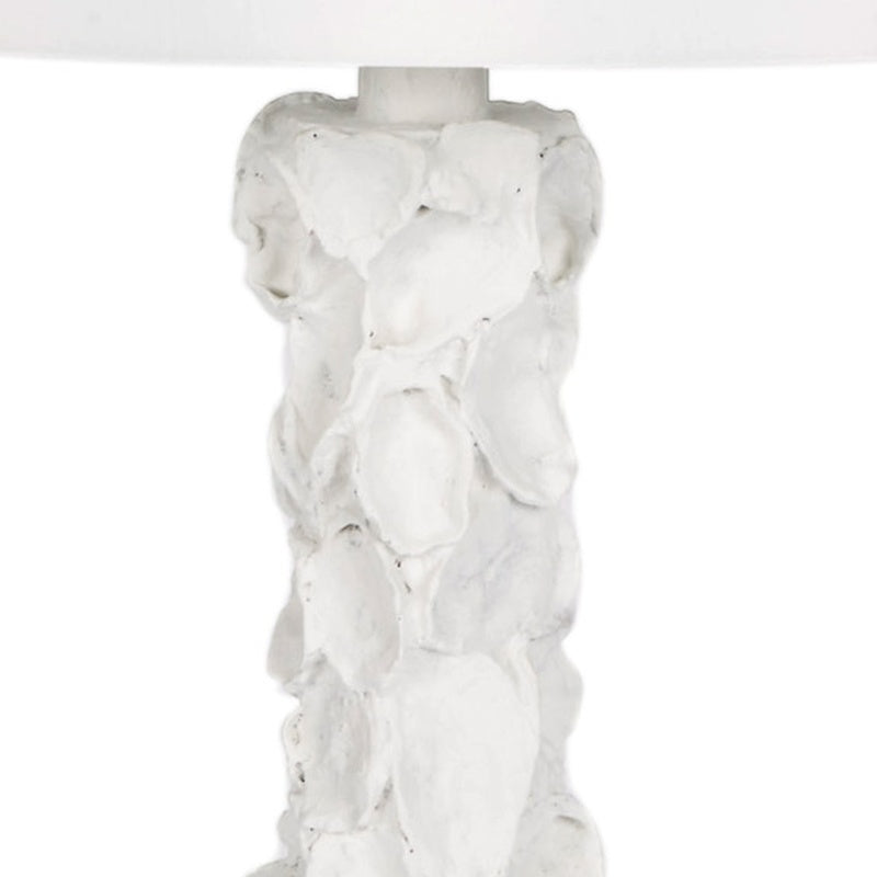 White gesso oyster shell lamp base with textured sculpted detail