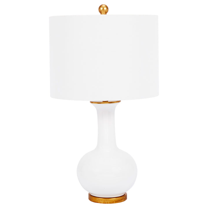 Klara white ceramic table lamp with a soft linen shade, perfect for brightening up modern living rooms or bedrooms.