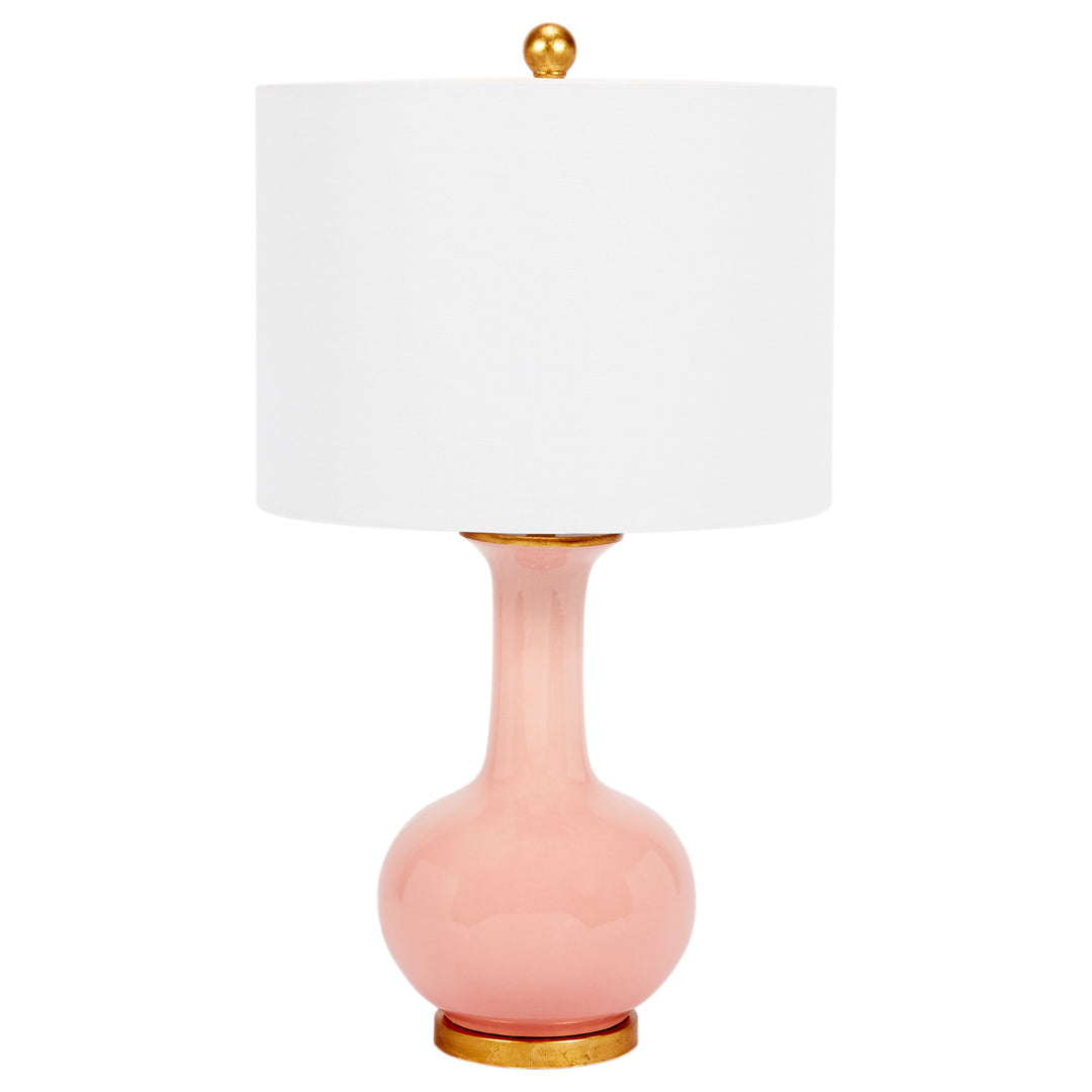 Soft and elegant Nela table lamp featuring a blush ceramic base and linen shade, perfect for brightening up living rooms or bedrooms.