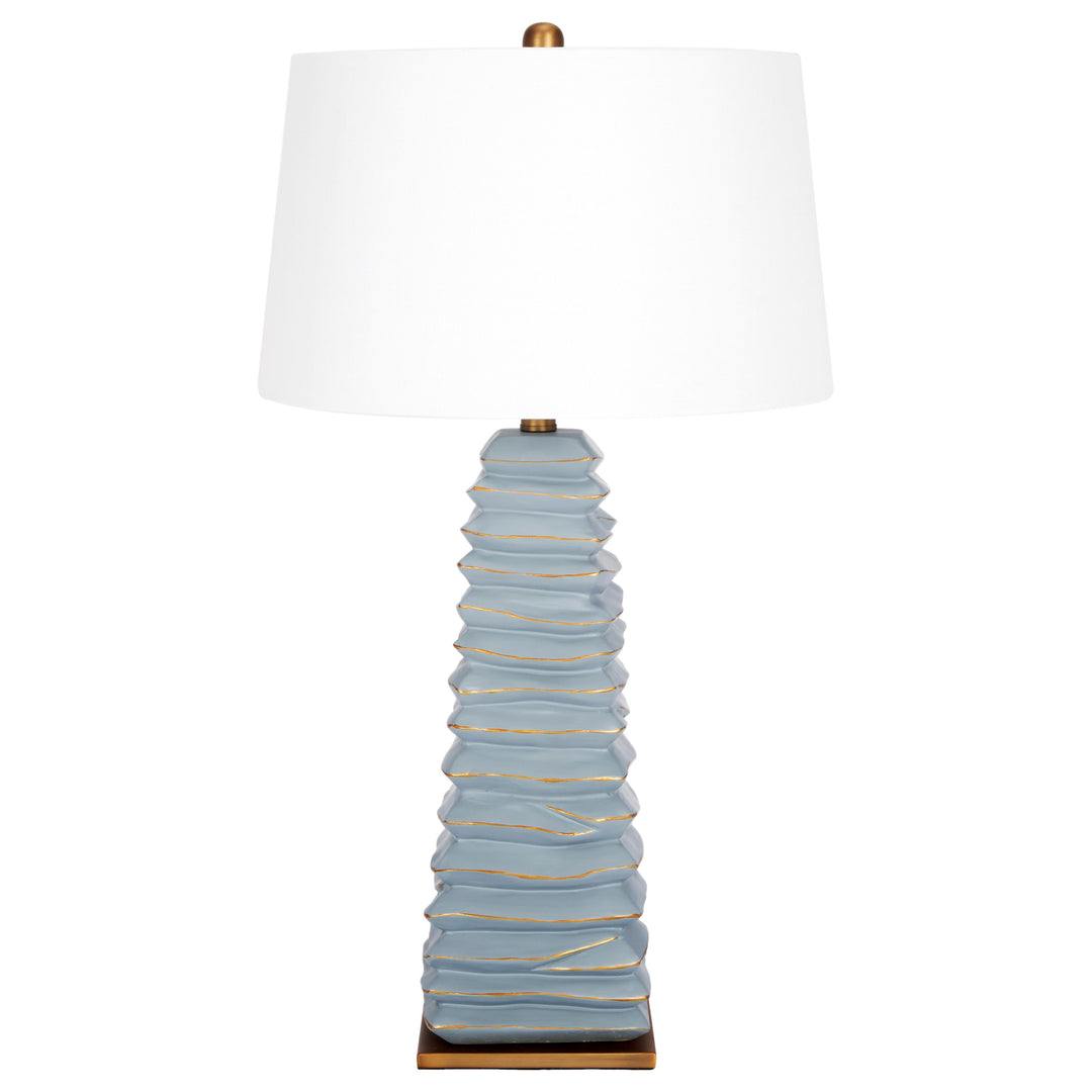 Carley soft teal table lamp with a natural linen shade, perfect for enhancing living rooms, bedrooms, or study spaces.