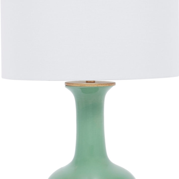 Green ceramic table lamp with white linen shade, rounded stem base