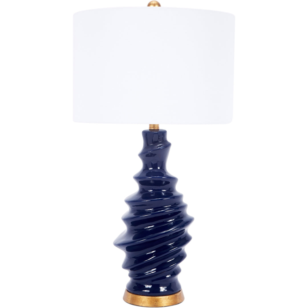 Elegant Connelly table lamp featuring a navy blue ceramic base and crisp linen shade, ideal for adding sophistication to any living room or bedroom.