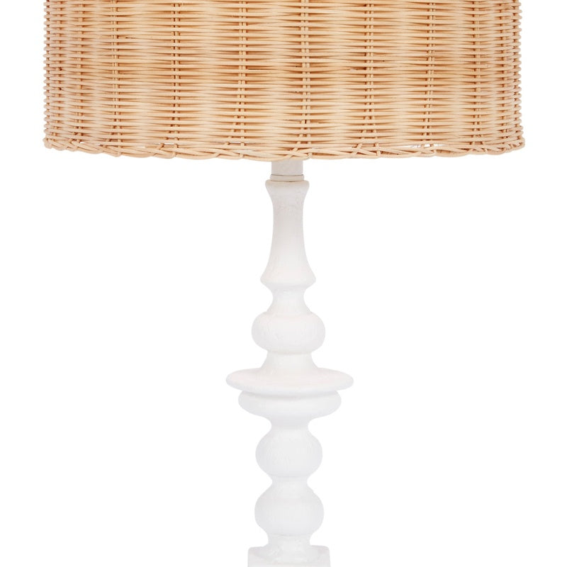 Rattan table lamp with woven shade and tall white gesso pedestal base