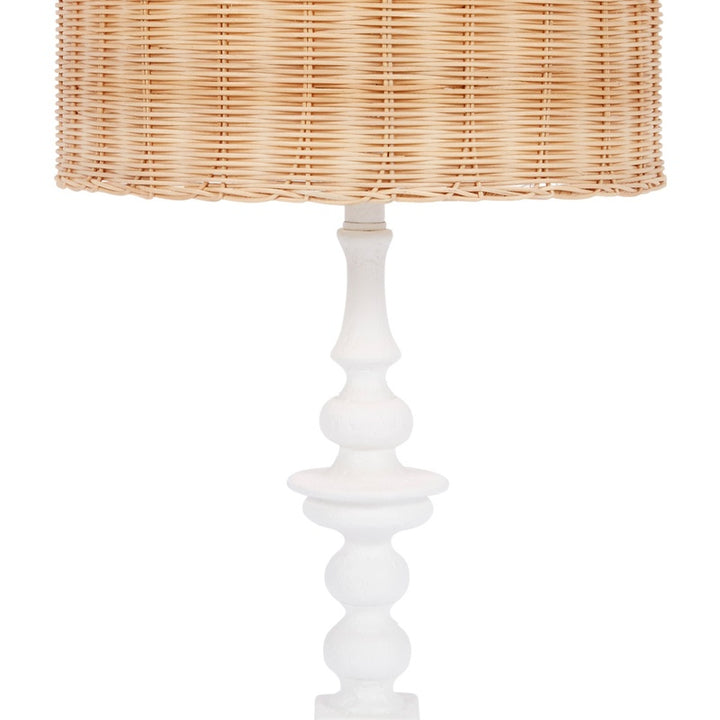 Rattan table lamp with woven shade and tall white gesso pedestal base