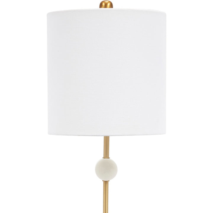 Gold stem buffet lamp with white fabric drum shade and white marble disc base