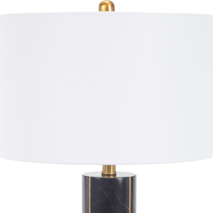 Brass-accent table lamp with black marble cylinder base and white fabric shade