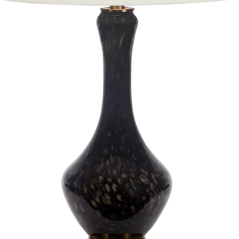 Black hand-blown glass lamp base with gold collar, slender teardrop shape