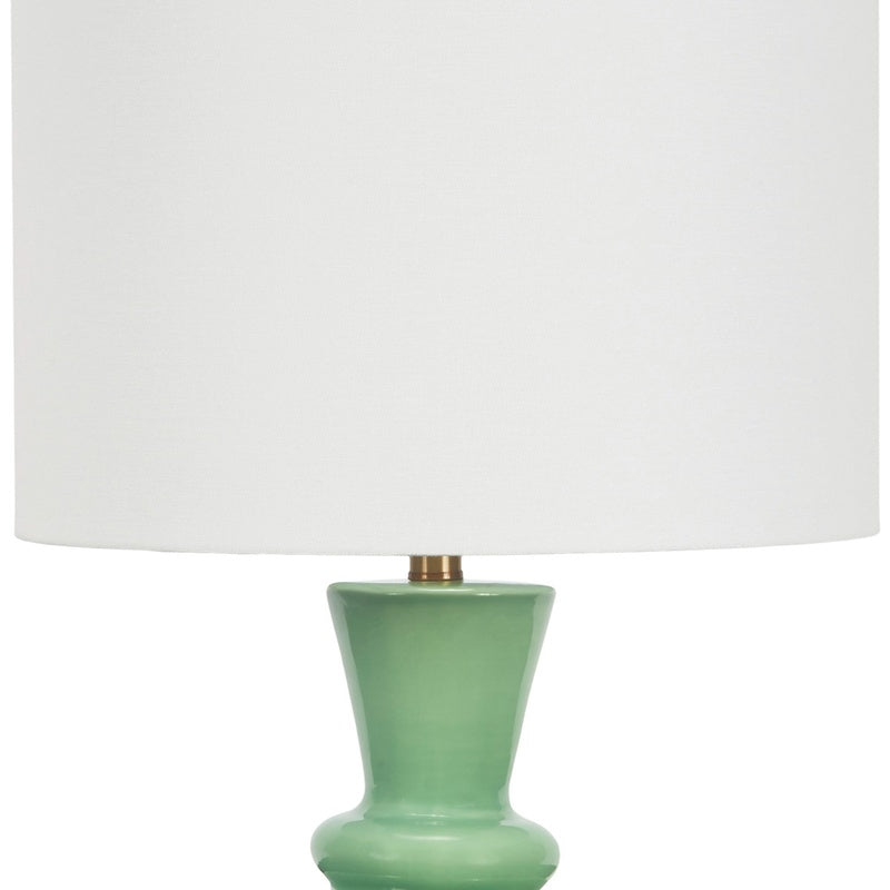 Ceramic table lamp with white drum shade and green ceramic urn base