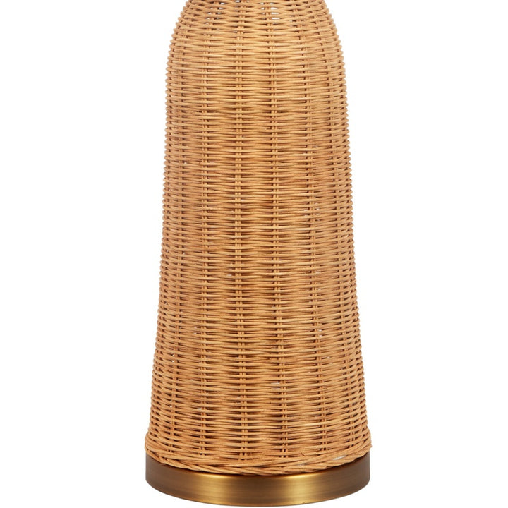 Rattan table lamp base with brass bottom and white linen drum shade