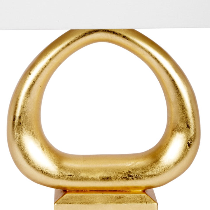 Gold table lamp oval metal loop with flat rectangular base