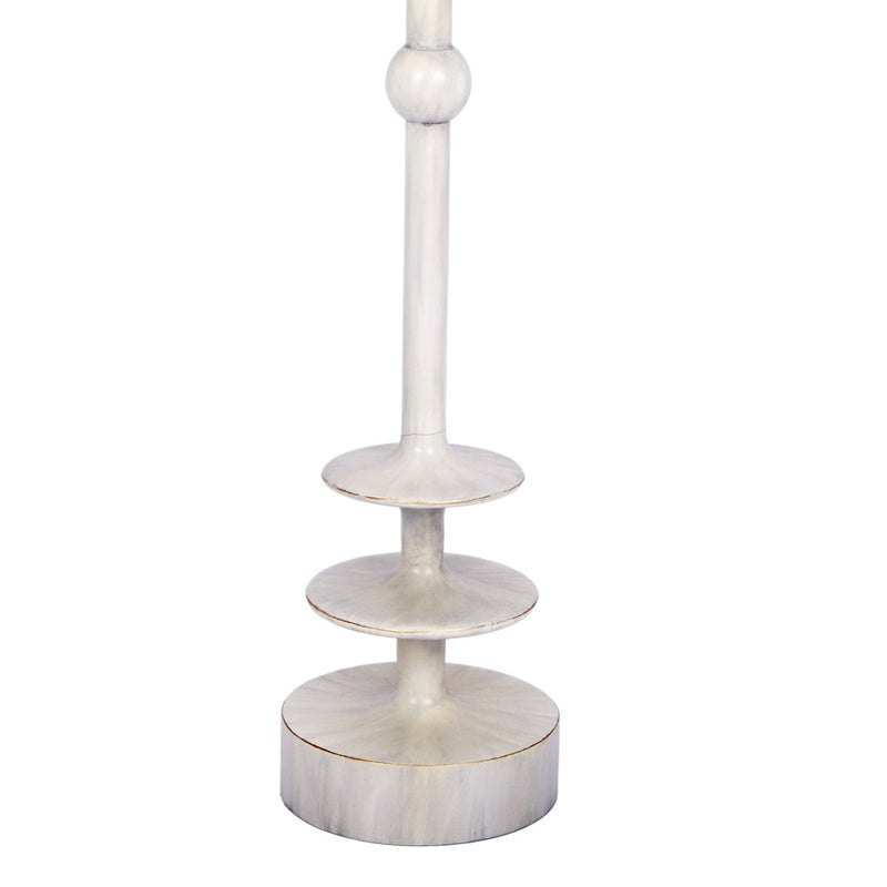 Brushed silver table lamp with white drum shade and stacked round bases