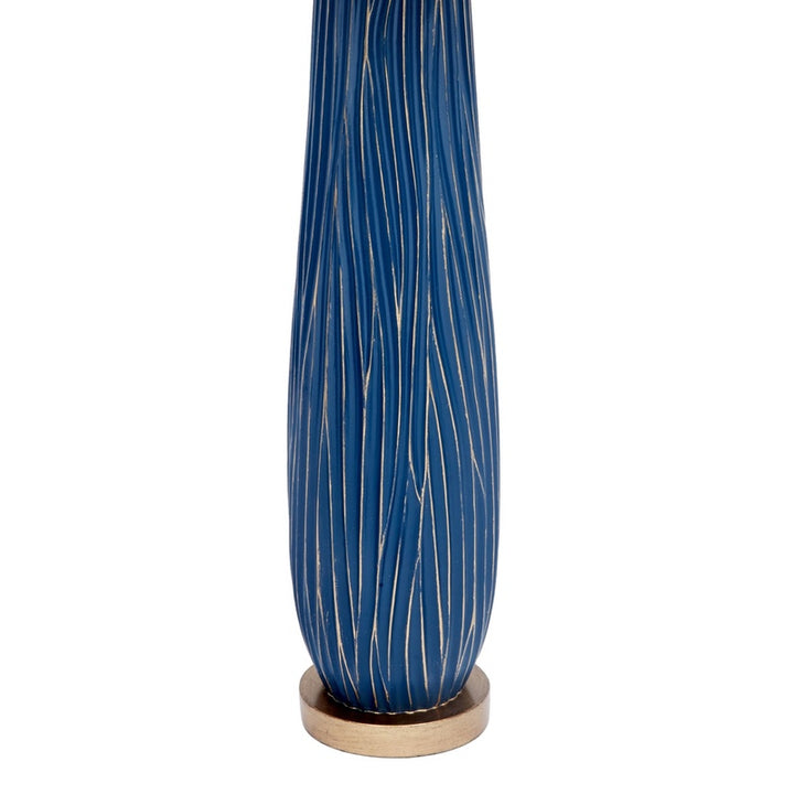 Table lamp with blue ribbed base, gold pinstripes, and wood base