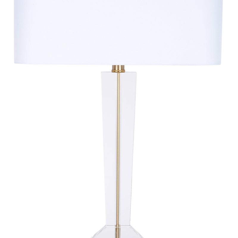 White linen crystal table lamp with brass-toned vertical stem and wide shade
