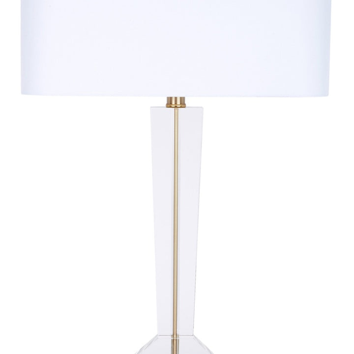 White linen crystal table lamp with brass-toned vertical stem and wide shade