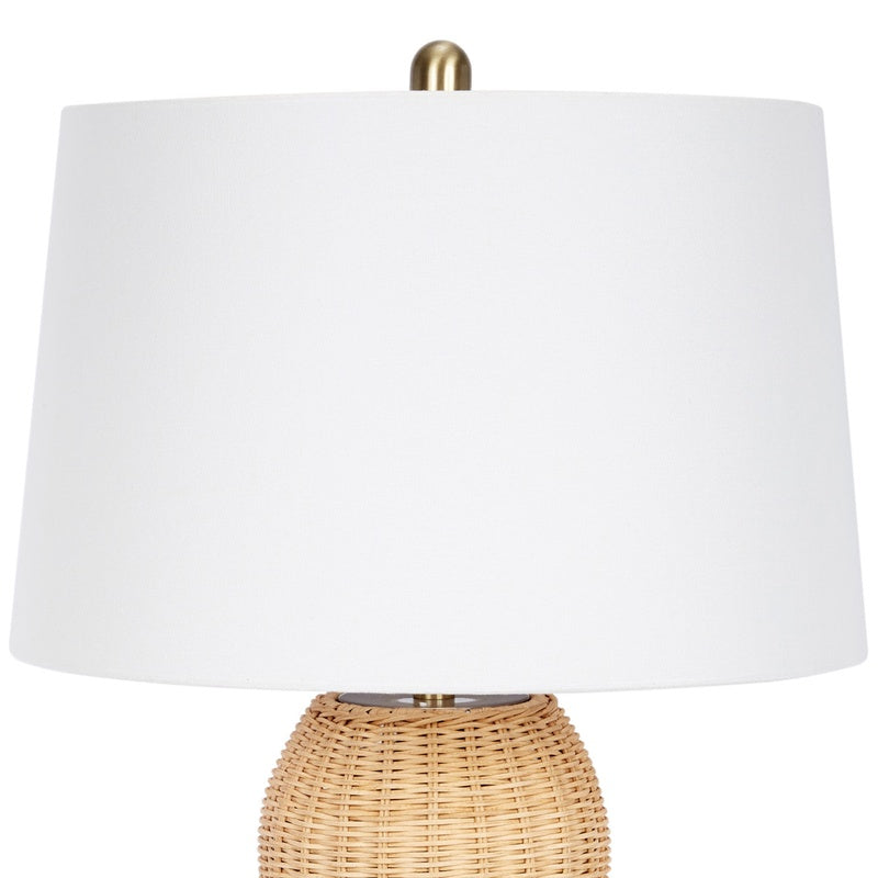 Estella rattan table lamp with white drum shade over woven beige base