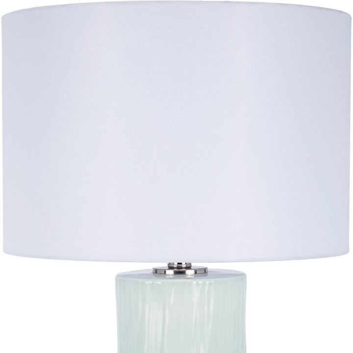 Ceramic table lamp with white fabric shade and mint green column base, chrome knob