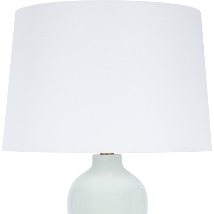 Ceramic table lamp with white drum shade and mint green ceramic base