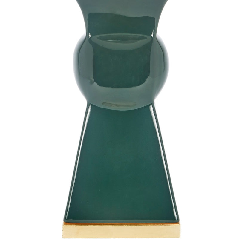 Dark green ceramic table lamp with narrow neck, flared base, and white drum shade