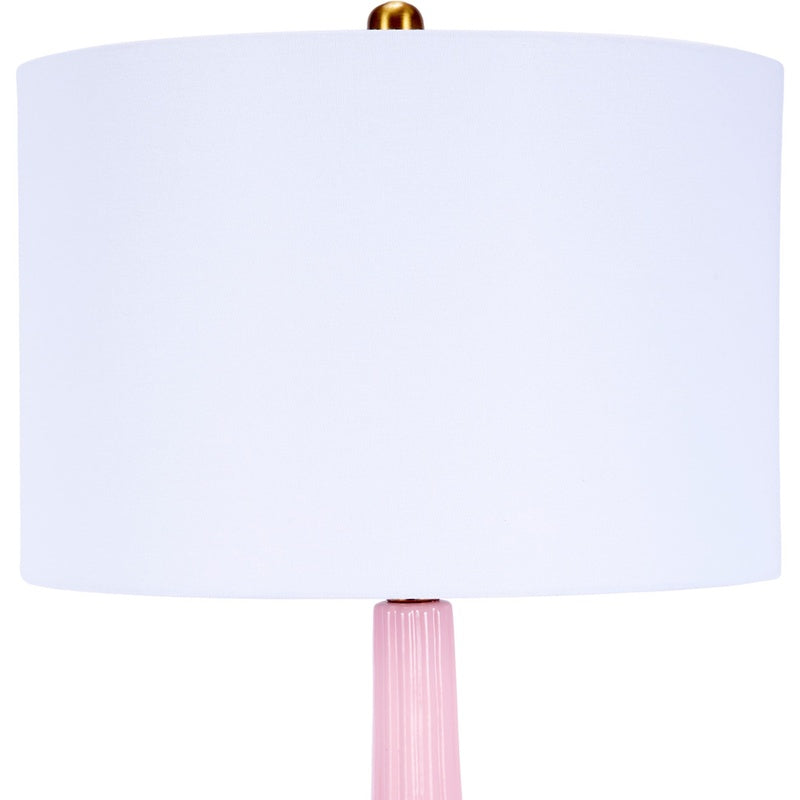 Blush pink table lamp with white drum shade and ribbed glass base