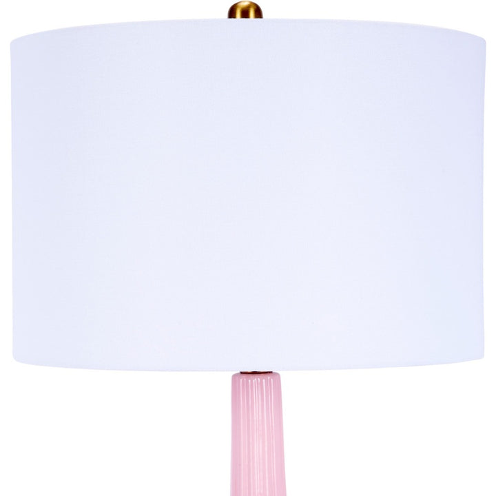 Blush pink table lamp with white drum shade and ribbed glass base