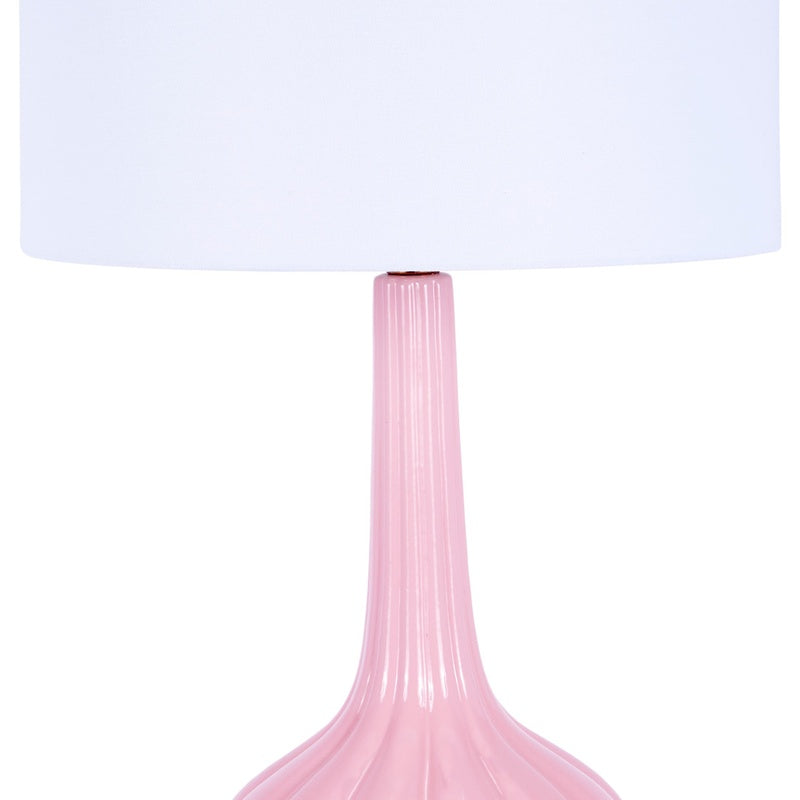 Blush pink table lamp with ribbed glass base and white drum shade