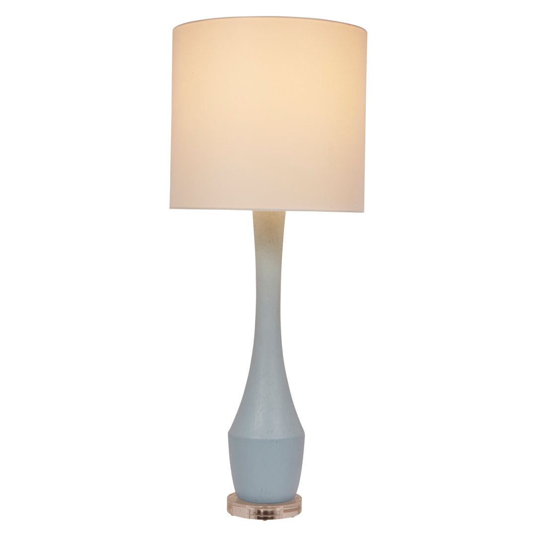 Soft robin’s egg blue gesso lamp with a white linen shade, bringing brightness and charm to any living space.