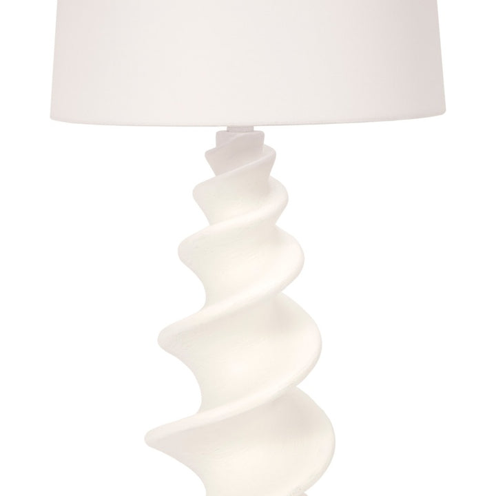 White shell lamp base with sculpted gesso ridges and white drum shade