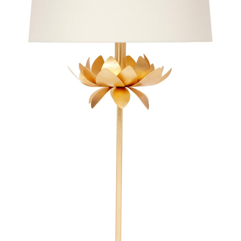 Gold leaf table lamp with white fabric shade and gold lotus-style centerpiece